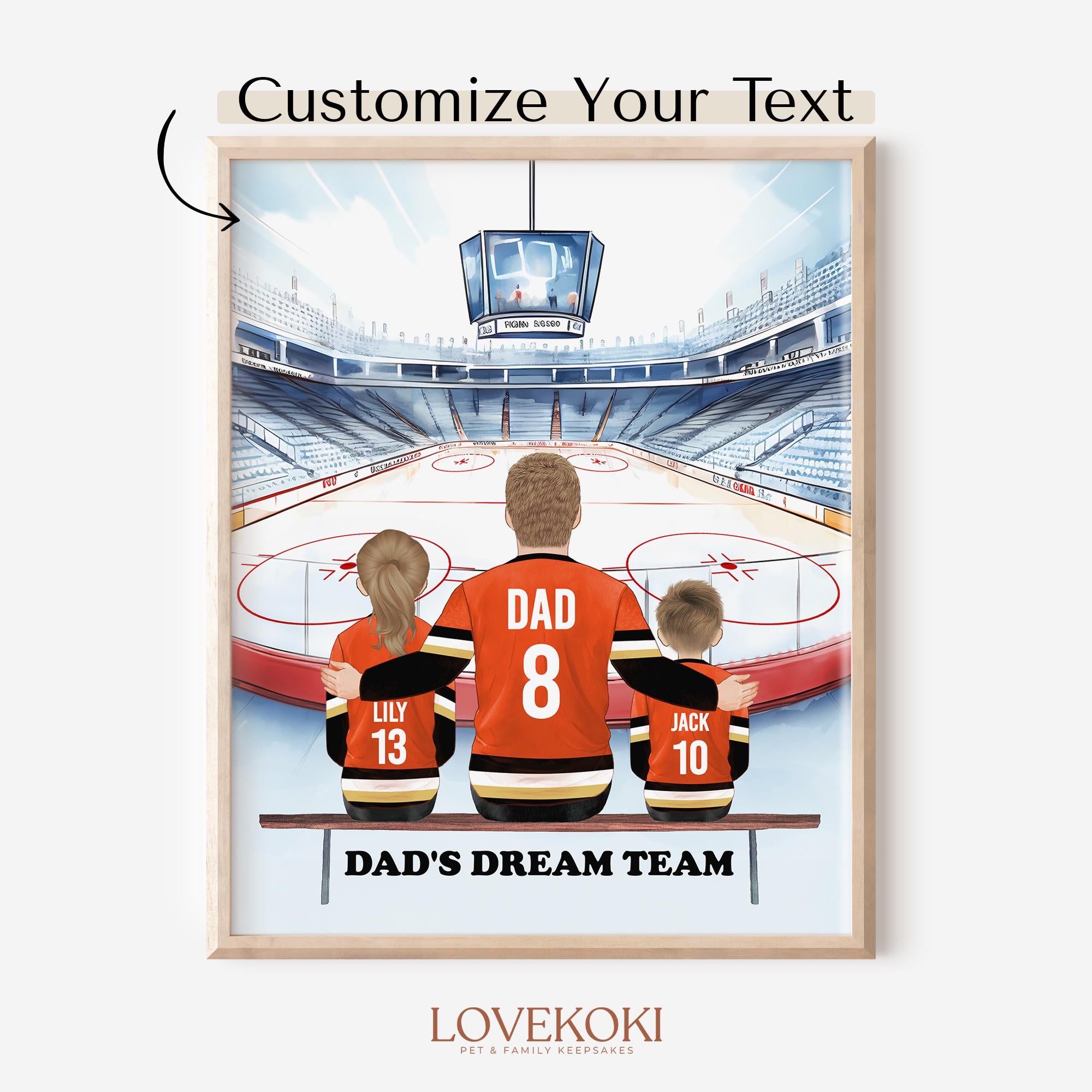 May include: A watercolor illustration of a family of three in hockey jerseys, standing in front of a hockey rink. The father is wearing a jersey with the number 8 and the word &#39;DAD&#39; on it. The daughter is wearing a jersey with the number 13 and the word &#39;LILY&#39; on it. The son is wearing a jersey with the number 10 and the word &#39;JACK&#39; on it. The text &#39;DAD&#39;S DREAM TEAM&#39; is written below the family. The illustration is framed in a light wood frame.